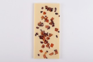 Xocolata blanca amb taronja confitada i nibs de cacau