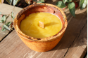 Vela artesanal en maceta de biomortero sostenible